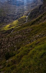 The Cinca waterfall falls from the cliffs of the Pineta Gorge into the valley