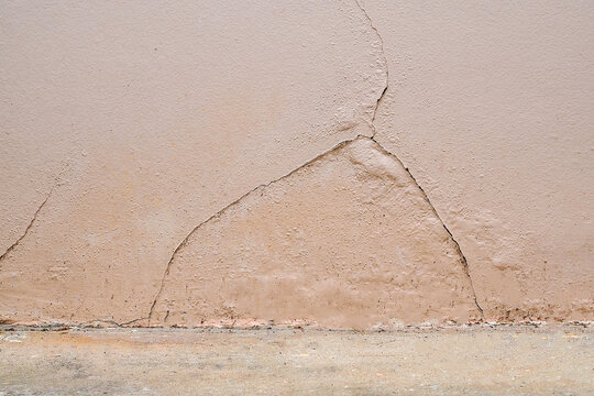 Paint and cracks from poor construction quality