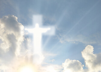Ascension of Christ. Shining silhouette in the clouds