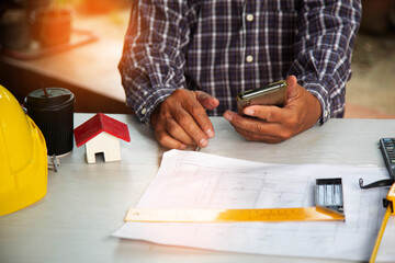 Engineers are searching for information to support the project design. blueprint  at Construction Site