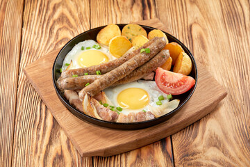 baked potato with sausage and egg