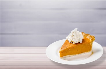 Tasty sweet piece of moist orange fruit pound cake on plate. Delicious breakfast, Recipe