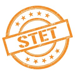 STET text written on orange vintage stamp.