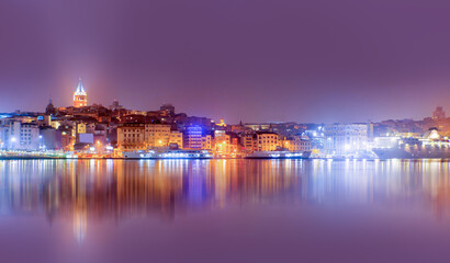 Naklejka premium Galata Tower, Galata Bridge, Karakoy district and Golden Horn at night, istanbul - Turkey