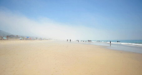 Playa de Bolonia en la costa de Tarifa con bruma y calima, Cadiz, Spain. Bolonia es una de las mejores playas de la costa de C&aacute;diz en el Oc&eacute;ano Atlantico 
