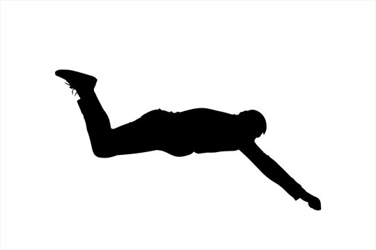 Rescuer. Rescue operation. A man lying on his stomach stretches forward. Skydiver. A guy in a cap, sneakers, and tracksuit lies on his stomach, face down. Black male silhouette isolated on white