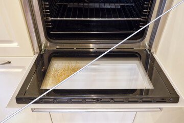 Dirty and clean oven, before and after cleaning and washing the stove glass. Washed grease on the...