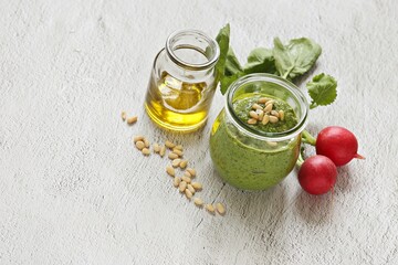 Pesto from radish leaves. Copy space