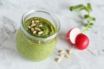 Pesto from radish leaves. Copy space
