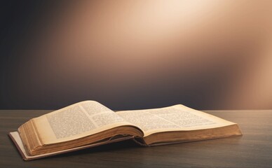 Grunge age book on the wooden desk table space. still life concept