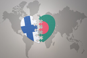 puzzle heart with the national flag of bangladesh and finland on a world map background. Concept.