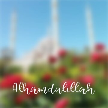 Alhamdulillah lettering vector illustration on blurred nature background