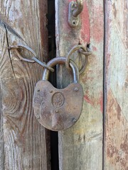 old lock on a wooden door