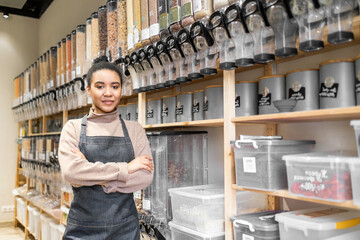 Portrait of african american woman owner of sustainable small local business. Young confident woman...