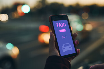 Woman ordering taxi online using mobile app on smart phone. Booking taxi using application online....