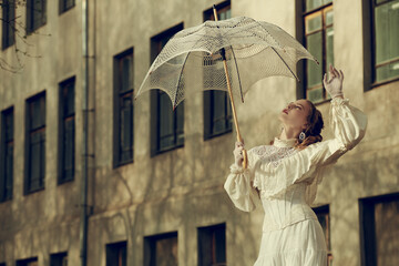 refined lady with umbrella