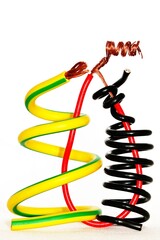 Different coloured wires used for electrical wiring. The colour representation for the live, neutral and grounding wires respectively are not internationally standardised.