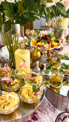 festive table decoration with various dishes at the event