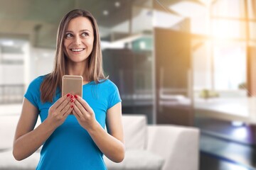 Happy young woman with modern smartphone