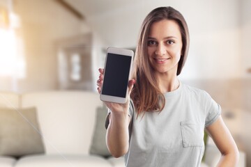 Happy young woman with modern smartphone