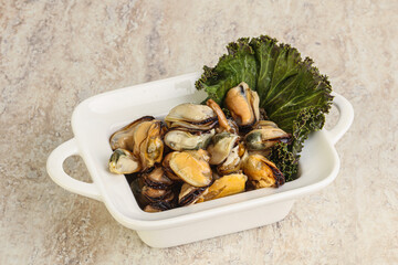 Tasty marinated mussels in the bowl