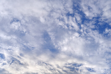 background light sky gradient, close-up of beautiful white fluffy clouds in blue sky, concept of lightness, elevation, heavenly space, the abode of God, natural basis for the designer