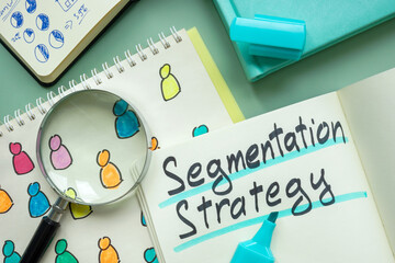 Report about segmentation strategy and magnifying glass. - obrazy, fototapety, plakaty