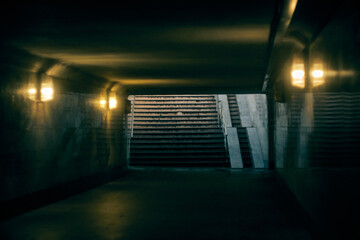 the dark gloomy tunnel of the underpass - obrazy, fototapety, plakaty