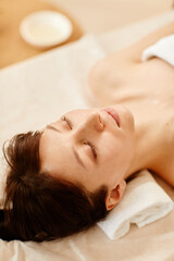 High angle portrait of smiling young woman enjoying relaxing SPA session in health club, copy space