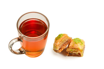 Turkish sweet baklava with turkish tea isolated on a white background. .