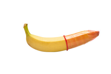 A banana with a condom on it isolated on white background.