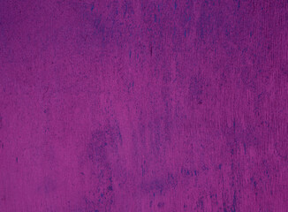 Obraz premium Texture from the surface of the old damaged purple paint on the wall.