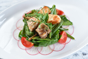 grilled fish and meat fillet, grilled vegetables, lettuce, asparagus, tomatoes, spinach
