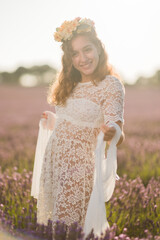 Fototapeta na wymiar summer meadow lavender field with young hispanic woman. beautiful in nature flower spring