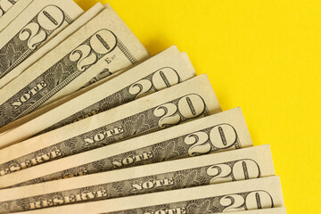 Big amount of old twenty dollar bills on golden background. Money earnings, payday or tax paying...