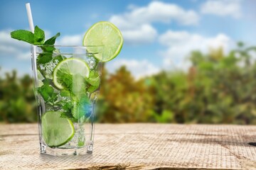 Exclusive alcoholic drink. Glass with cocktail with lemon