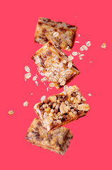 fitness candy, oatmeal flying on pink background