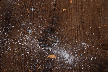 Old wooden background in splashes of paint