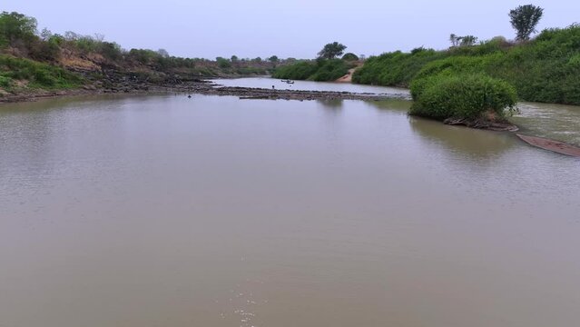 Brown River in African because of illegal mining, Oti River Ghana