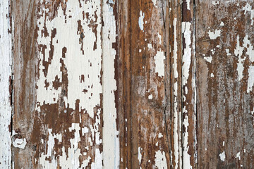 Old wood chipped background, scratched white paint on wooden boards. Old white solid wood slats Rustic shabby frame Background.
