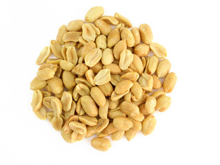 Peeled salted peanuts on a white background. Heap of roasted peanuts without husks close-up. Salted nuts, snacks for beer top view.