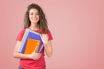 Young fun student woman wear shirt holding books notebooks