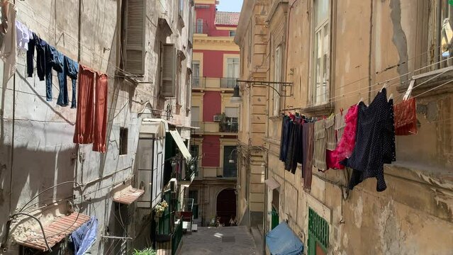 Clothes moving in the wind in the ancient streets of Napoli (Naples)