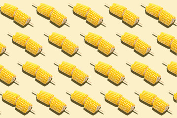 Tasty baked corn cobs on white background