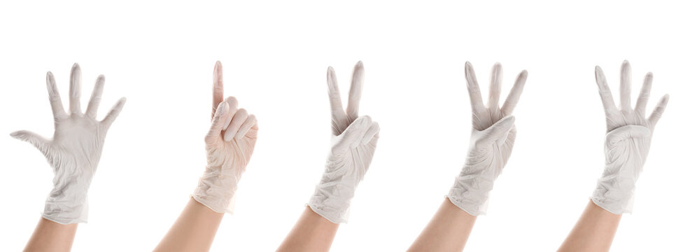 Set of gesturing hands in medical gloves isolated on white