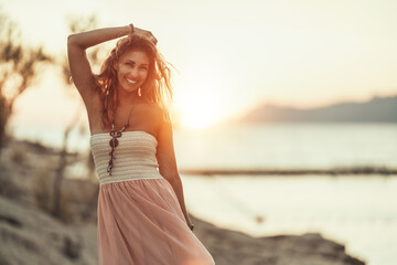 Woman Enjoying A Summer Vacation At The Beach