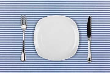 Festive creative table setting. Round plate and cutlery. Valentine's Day, Wedding Day, Birthday, Women's Day and Mother's Day.