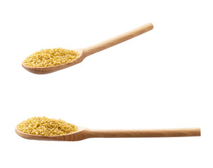 wooden spoon with bulgur isolated on white background.