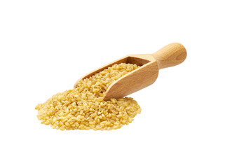 Small wooden spoon or scoop with dry bulgur isolated on white background.