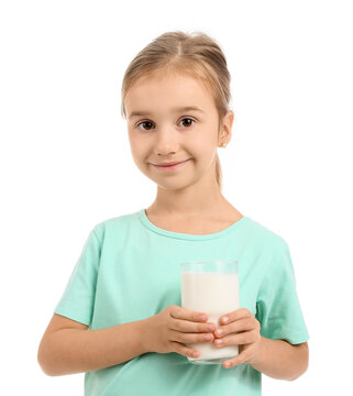 Portrait of little girl with glass of milk on white background